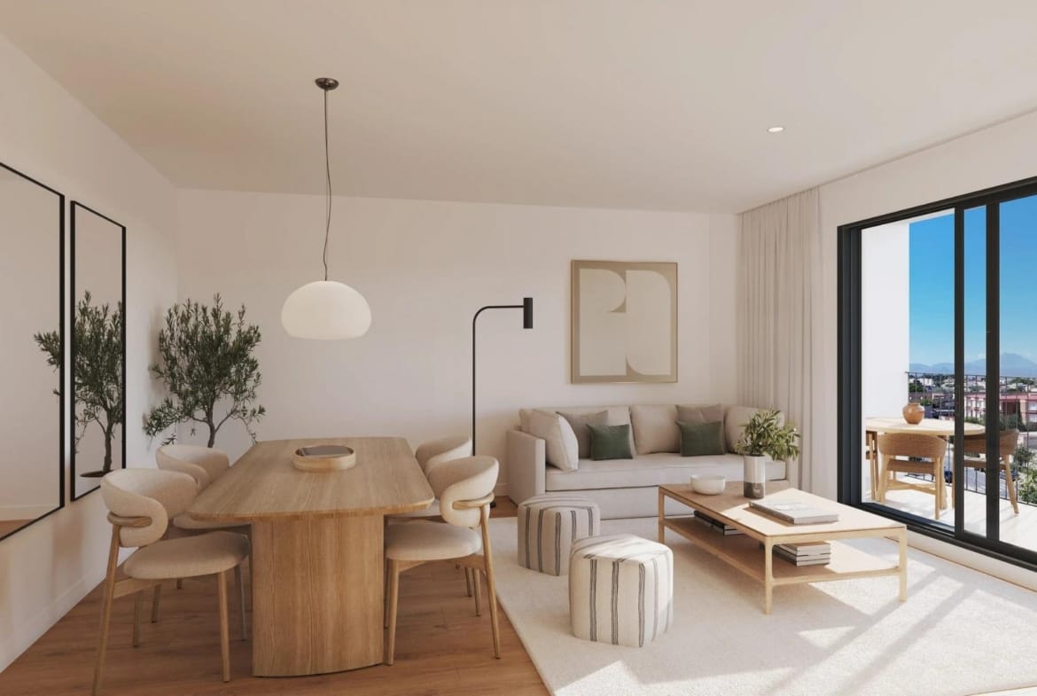 Living room with wooden dining table and balcony access in San Agustín, Alicante