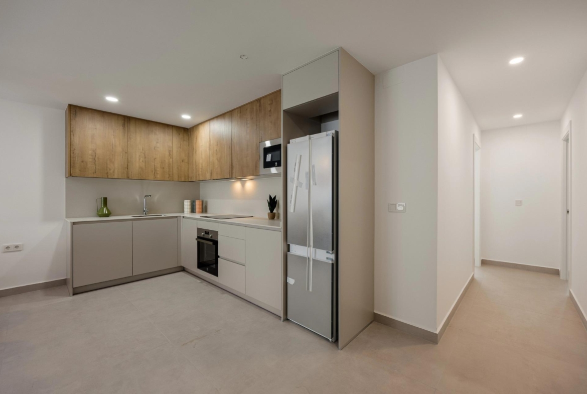 Unique-Investment-Opportunity-in-Villajoyosa-Costa-Blanca-North-10 Fitted kitchen and hallway in the Villajoyosa apartment