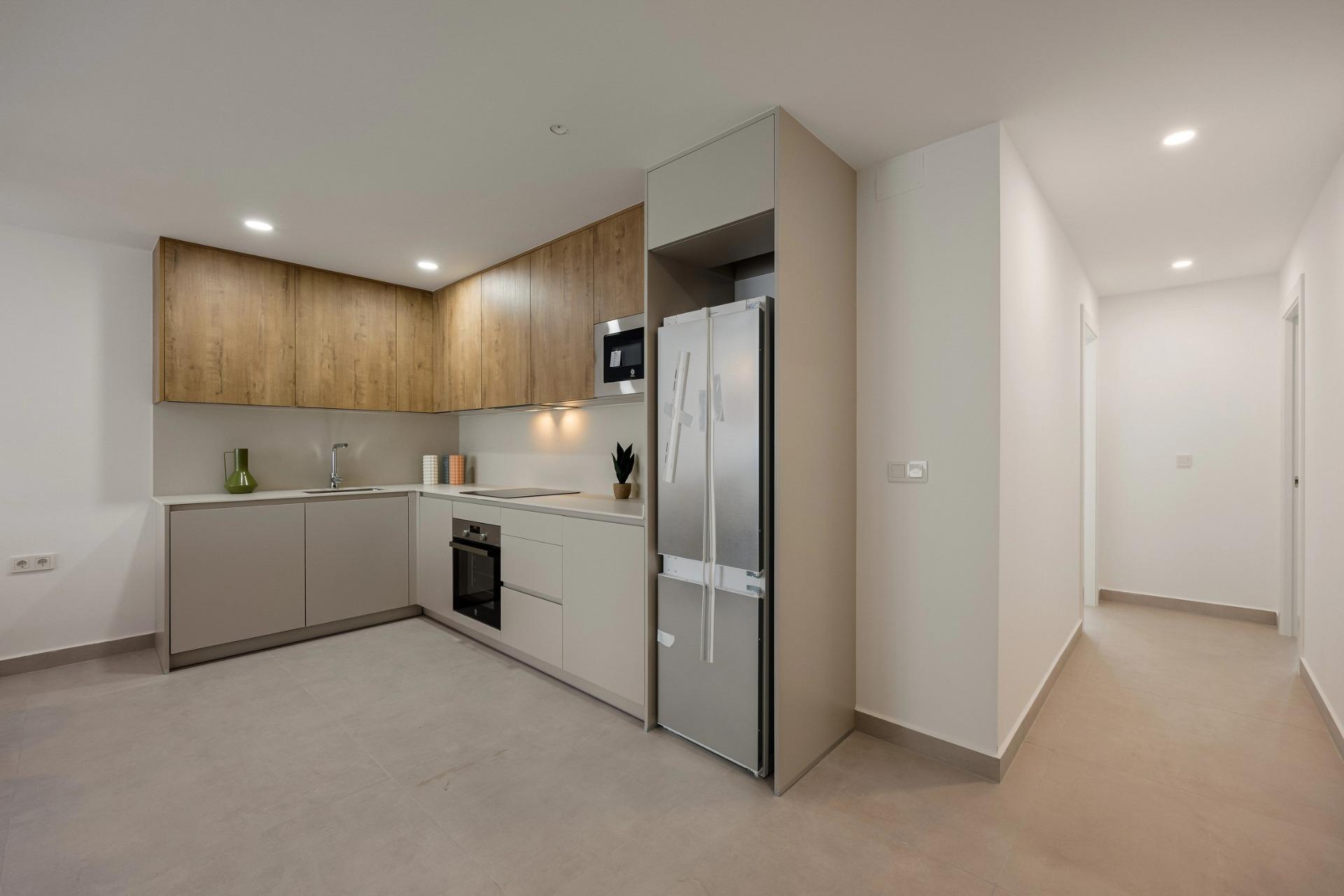 Unique-Investment-Opportunity-in-Villajoyosa-Costa-Blanca-North-10 Fitted kitchen and hallway in the Villajoyosa apartment