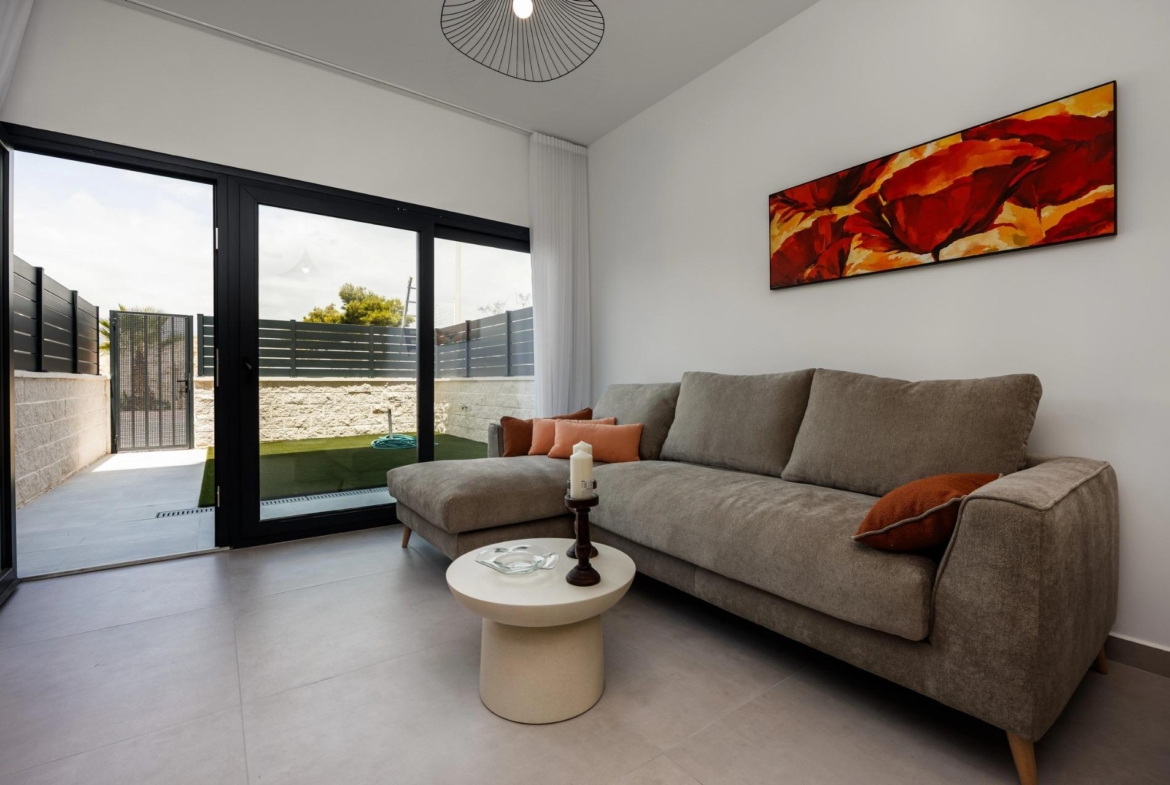 Unique-Investment-Opportunity-in-Villajoyosa-Costa-Blanca-North-5 Living room opening onto the private garden terrace