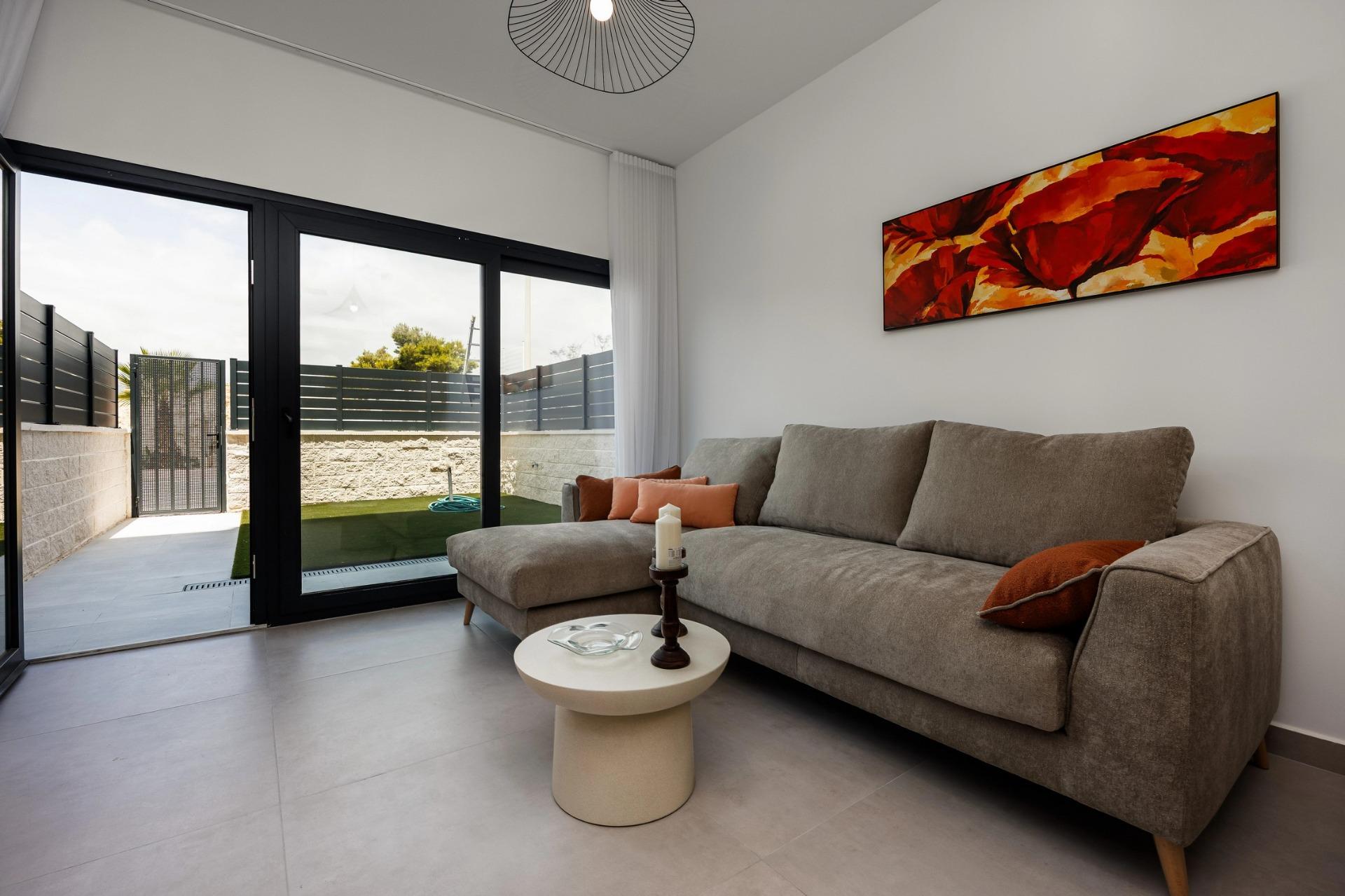 Unique-Investment-Opportunity-in-Villajoyosa-Costa-Blanca-North-5 Living room opening onto the private garden terrace