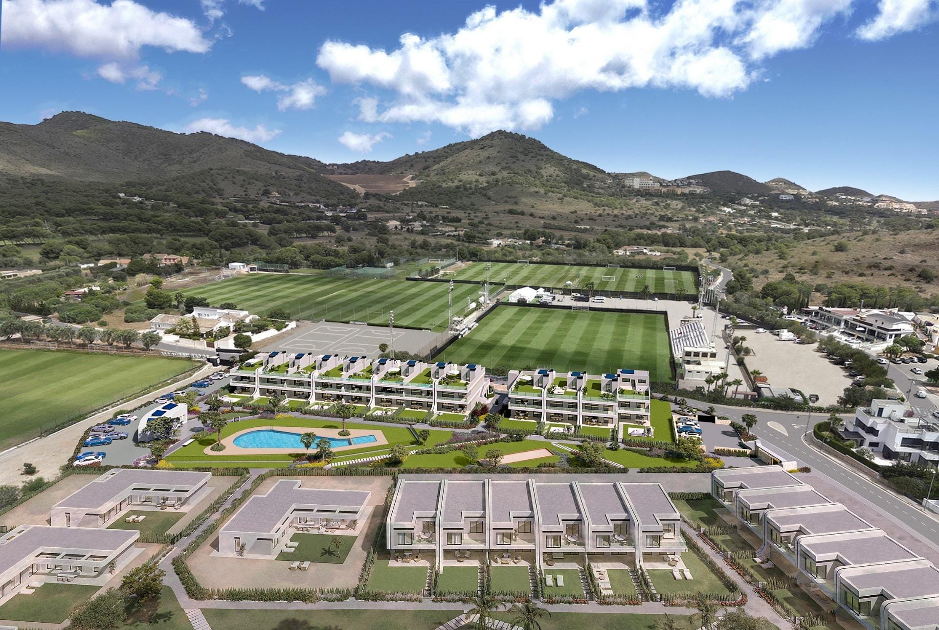 terraced houses and villas at La Manga Club Aerial rendering of the development beside sports grounds and mountain scenery in La Manga Club, Murcia