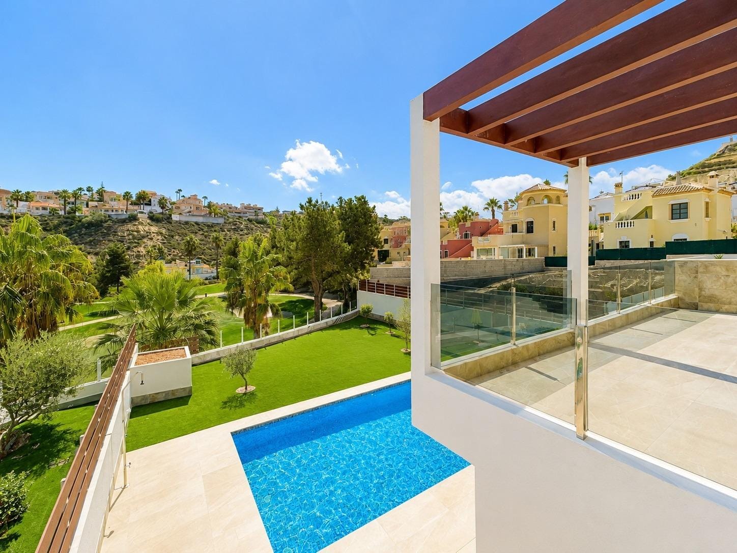 Terrace overlooking a private swimming pool and La Marquesa Golf in La Marquesa, Ciudad Quesada, Alicante