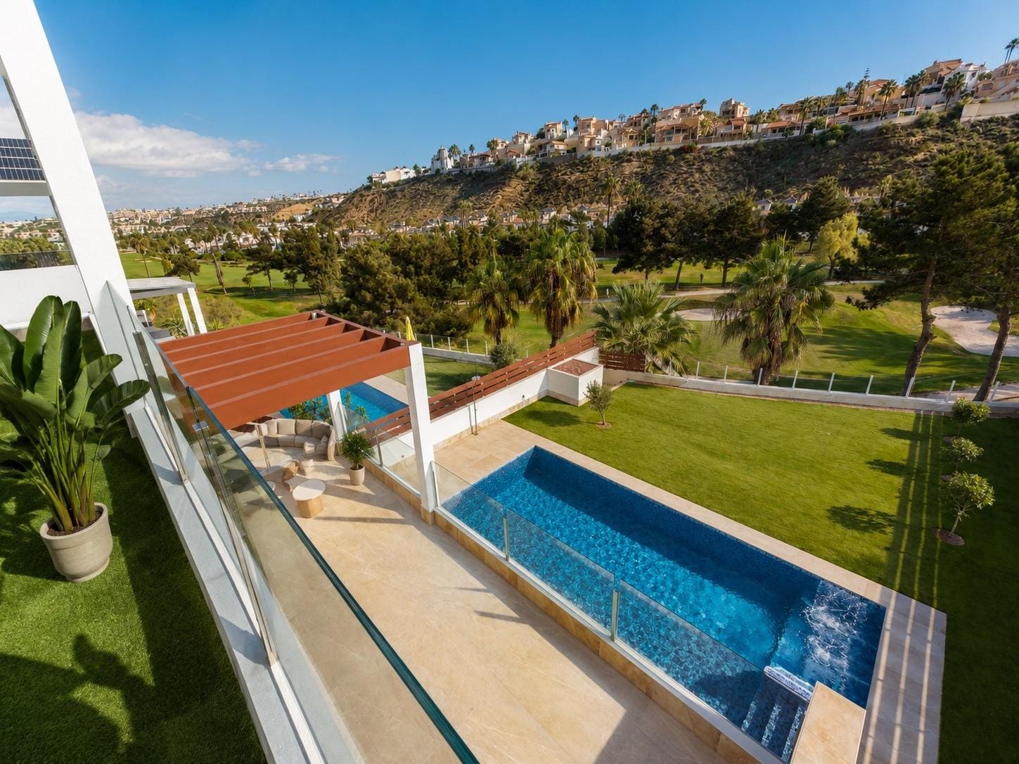 Balcony view over the pool, garden and golf fairway in La Marquesa, Ciudad Quesada, Alicante