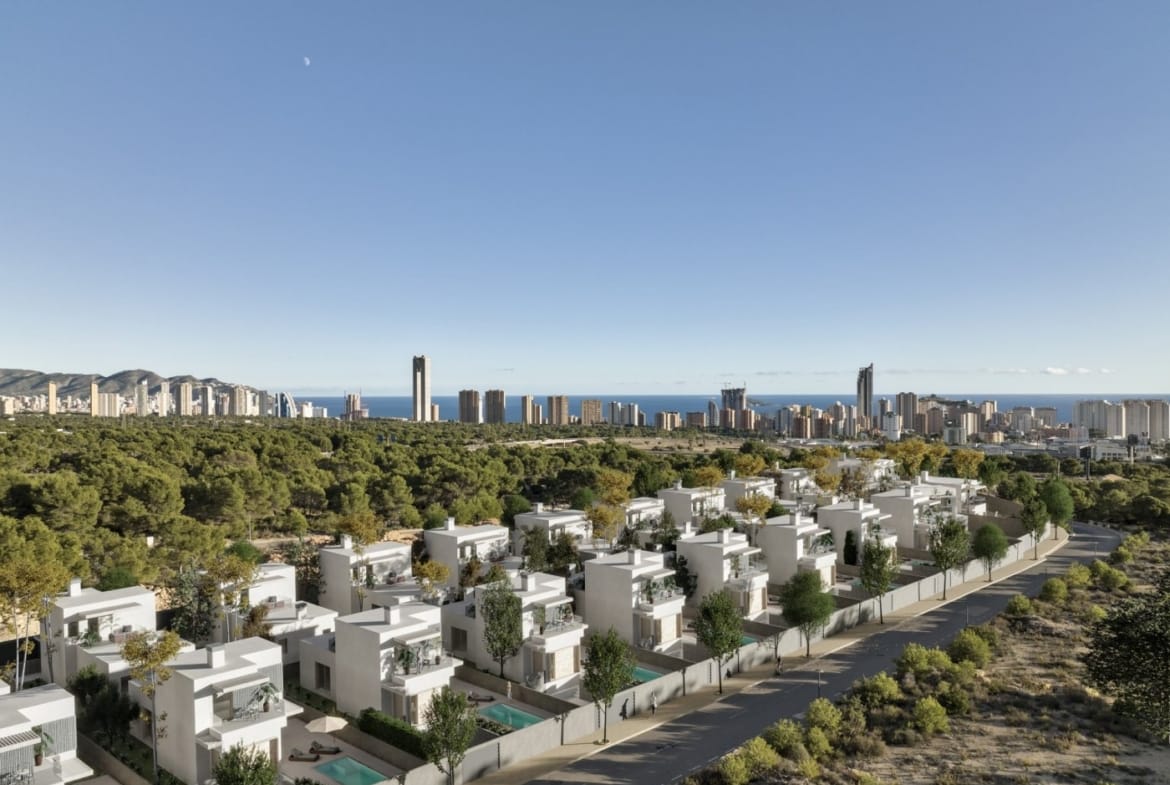Aerial view of the villa development towards the Benidorm skyline in Sierra Cortina, Finestrat, Alicante