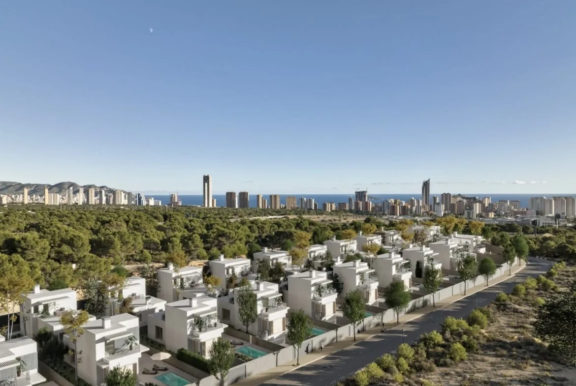 Aerial view of the villa development towards the Benidorm skyline in Sierra Cortina, Finestrat, Alicante