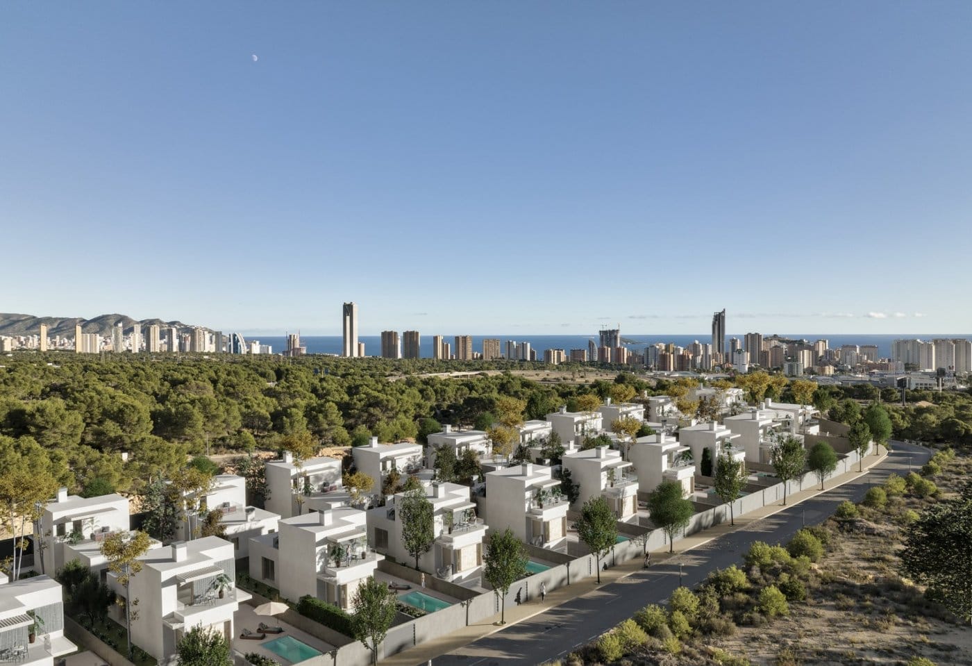 Aerial view of the villa development towards the Benidorm skyline in Sierra Cortina, Finestrat, Alicante