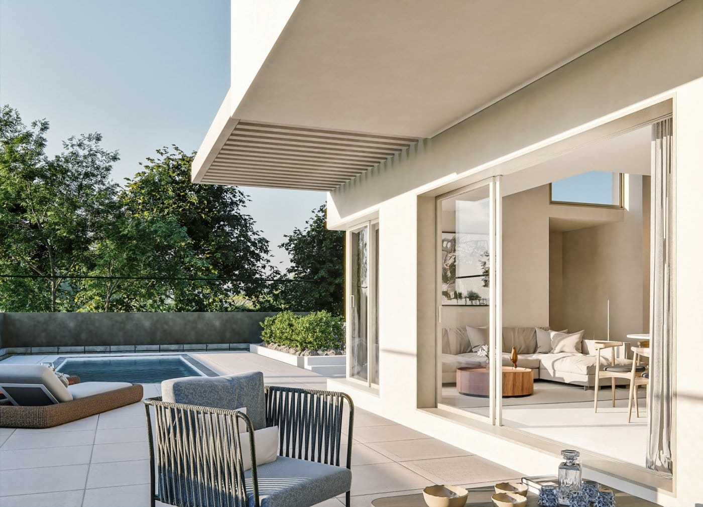 Covered terrace opening to the living area beside the private pool in Sierra Cortina, Finestrat, Alicante