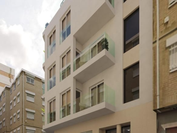 Side façade render of the apartment building in Guardamar del Segura, Alicante