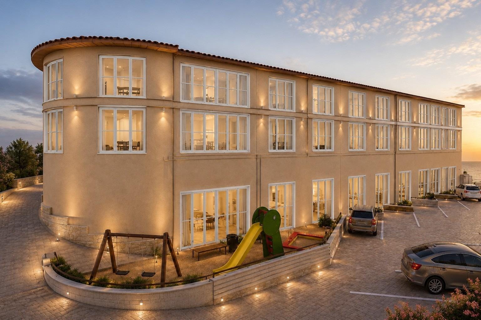 Rendering of the renovated apartment building with a small communal play area in El Muscaret, Relleu, Alicante