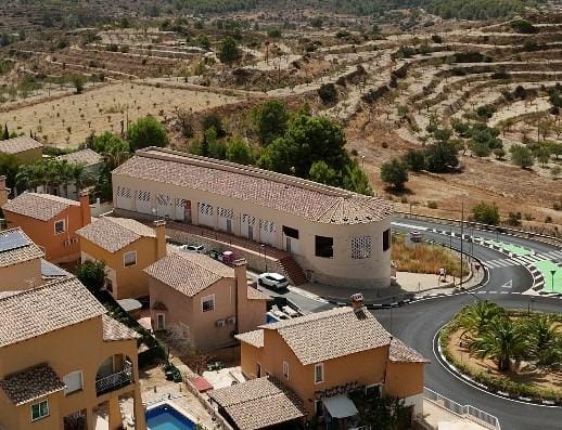 Aerial photograph of the existing building beside the surrounding countryside in El Muscaret, Relleu, Alicante