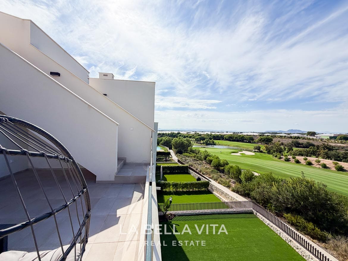 Modern Resale Apartment fot sale in Lo Romero Golf, Pilar de la Horadada, Alicante-2 Glass-fronted terrace with a hanging chair and views across the golf course