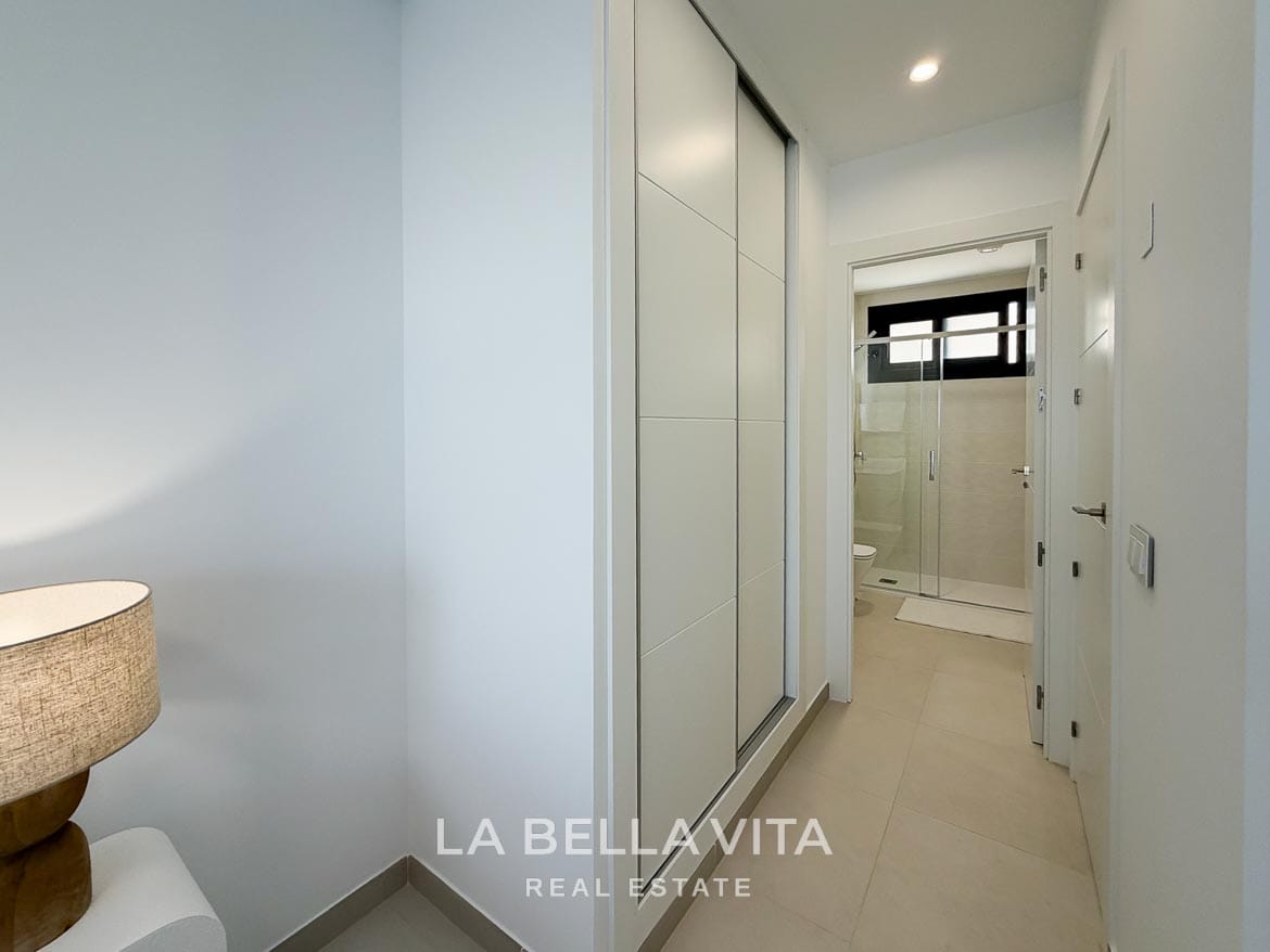 Modern Resale Apartment fot sale in Lo Romero Golf, Pilar de la Horadada, Alicante-24 Built-in sliding wardrobe in the main bedroom beside the entrance to the en-suite shower room