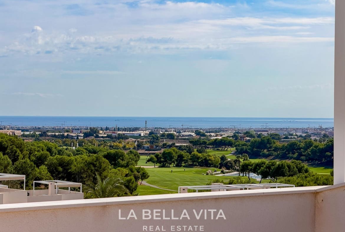 Mediterranean Sea views beyond the fairways and trees at Lo Romero Golf