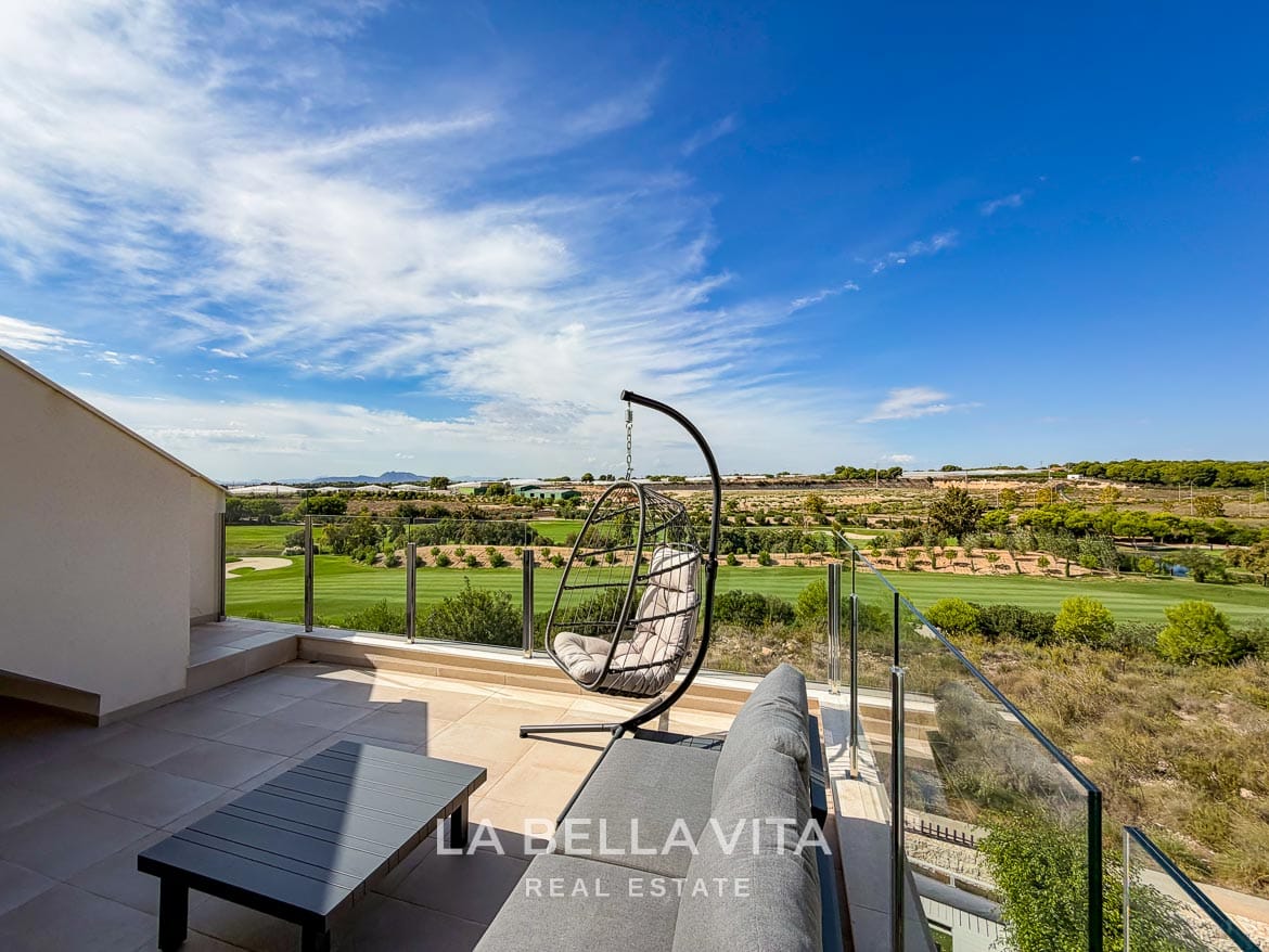 Modern Resale Apartment fot sale in Lo Romero Golf, Pilar de la Horadada, Alicante-31 Sunny terrace seating with a hanging egg chair overlooking the fairway