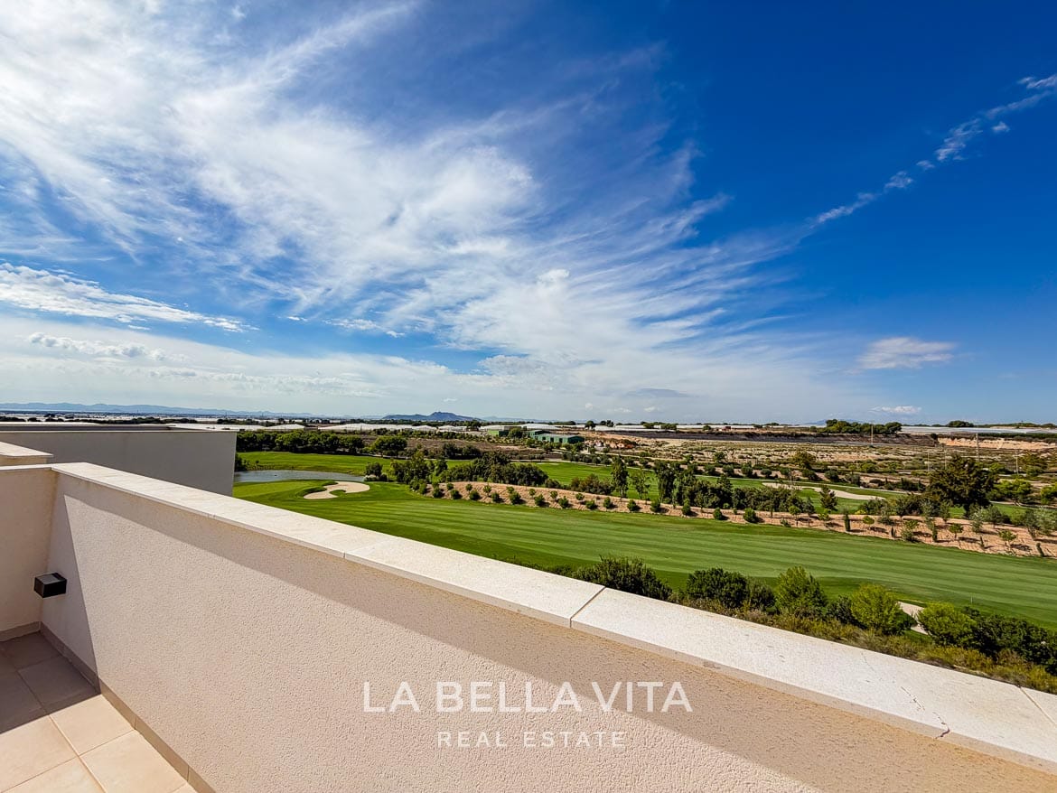 Modern Resale Apartment fot sale in Lo Romero Golf, Pilar de la Horadada, Alicante-39 Wide golf-course view over the roof solarium wall, with fairways and countryside beyond