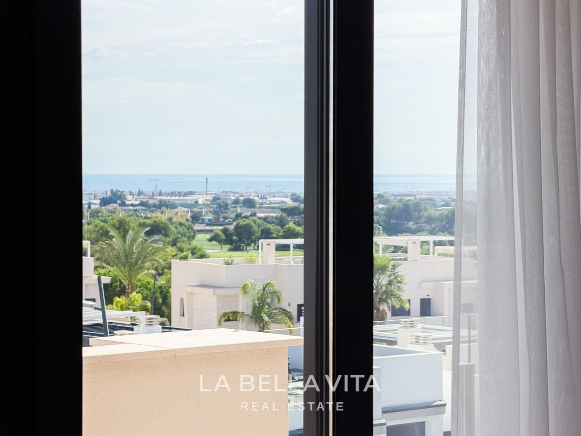 Modern Resale Apartment fot sale in Lo Romero Golf, Pilar de la Horadada, Alicante-4 Sea views through the penthouse window over neighbouring homes and the golf course