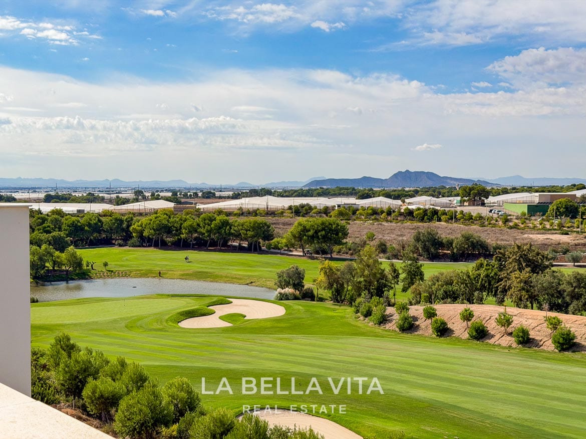 Modern Resale Apartment fot sale in Lo Romero Golf, Pilar de la Horadada, Alicante-40 Golf green, sand bunker and lake below the penthouse, with hills in the distance