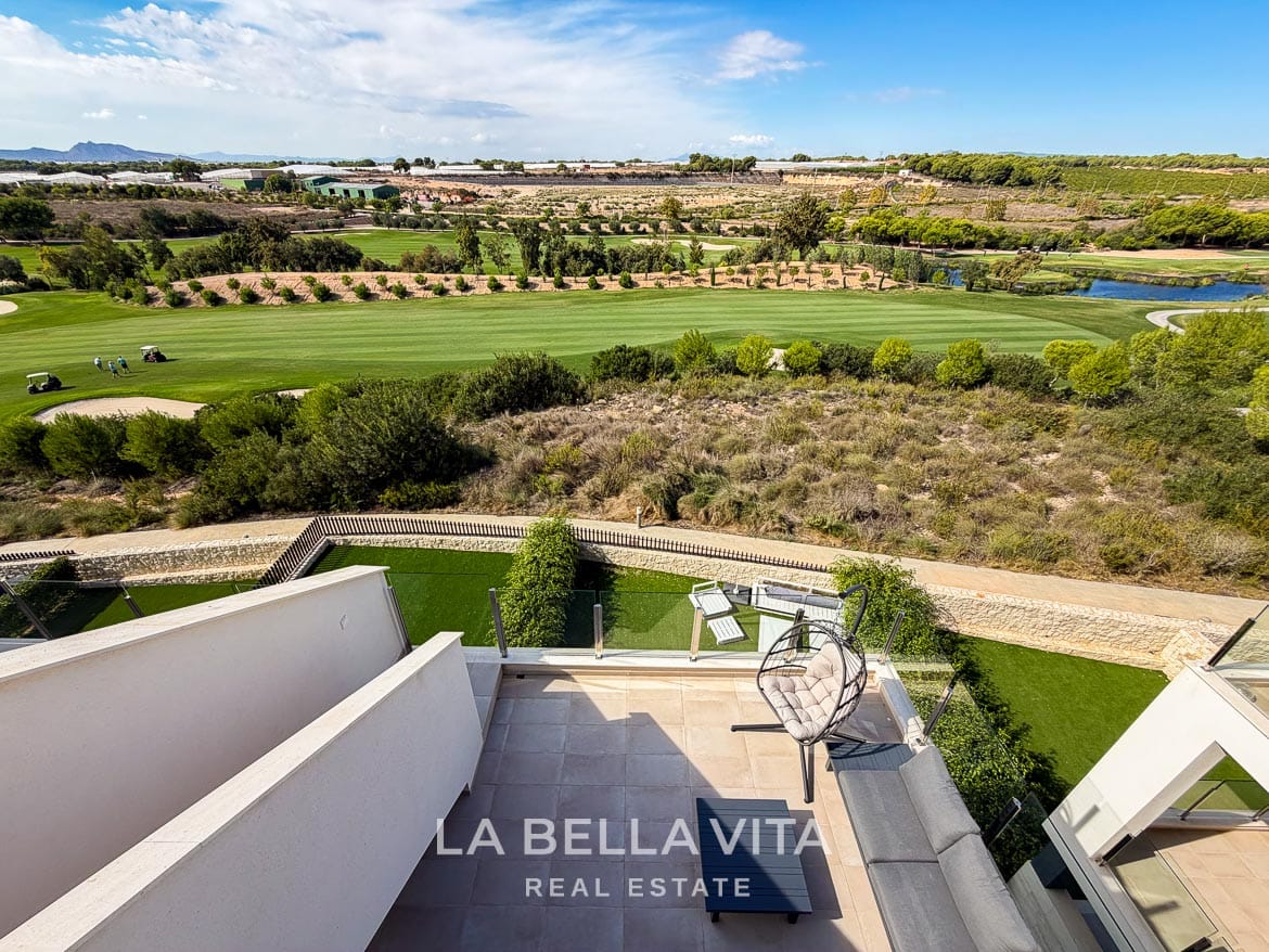 Modern Resale Apartment fot sale in Lo Romero Golf, Pilar de la Horadada, Alicante-41 View down from the solarium to the furnished terrace and adjacent golf fairway