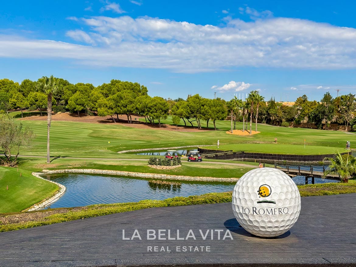 Modern Resale Apartment fot sale in Lo Romero Golf, Pilar de la Horadada, Alicante-51 Lo Romero Golf ball sculpture beside a lake, with the golf course and palms beyond