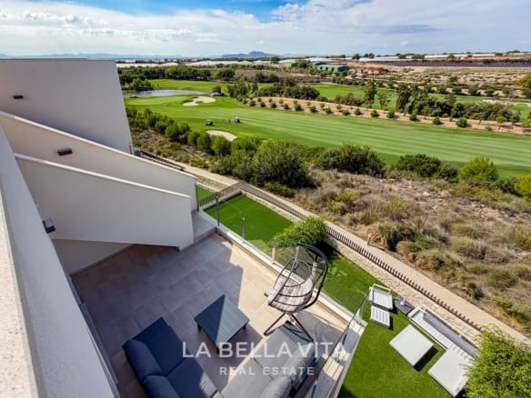 Penthouse terrace with lounge seating overlooking the fairway at Lo Romero Golf