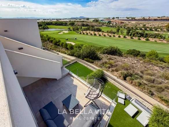 Penthouse terrace with lounge seating overlooking the fairway at Lo Romero Golf