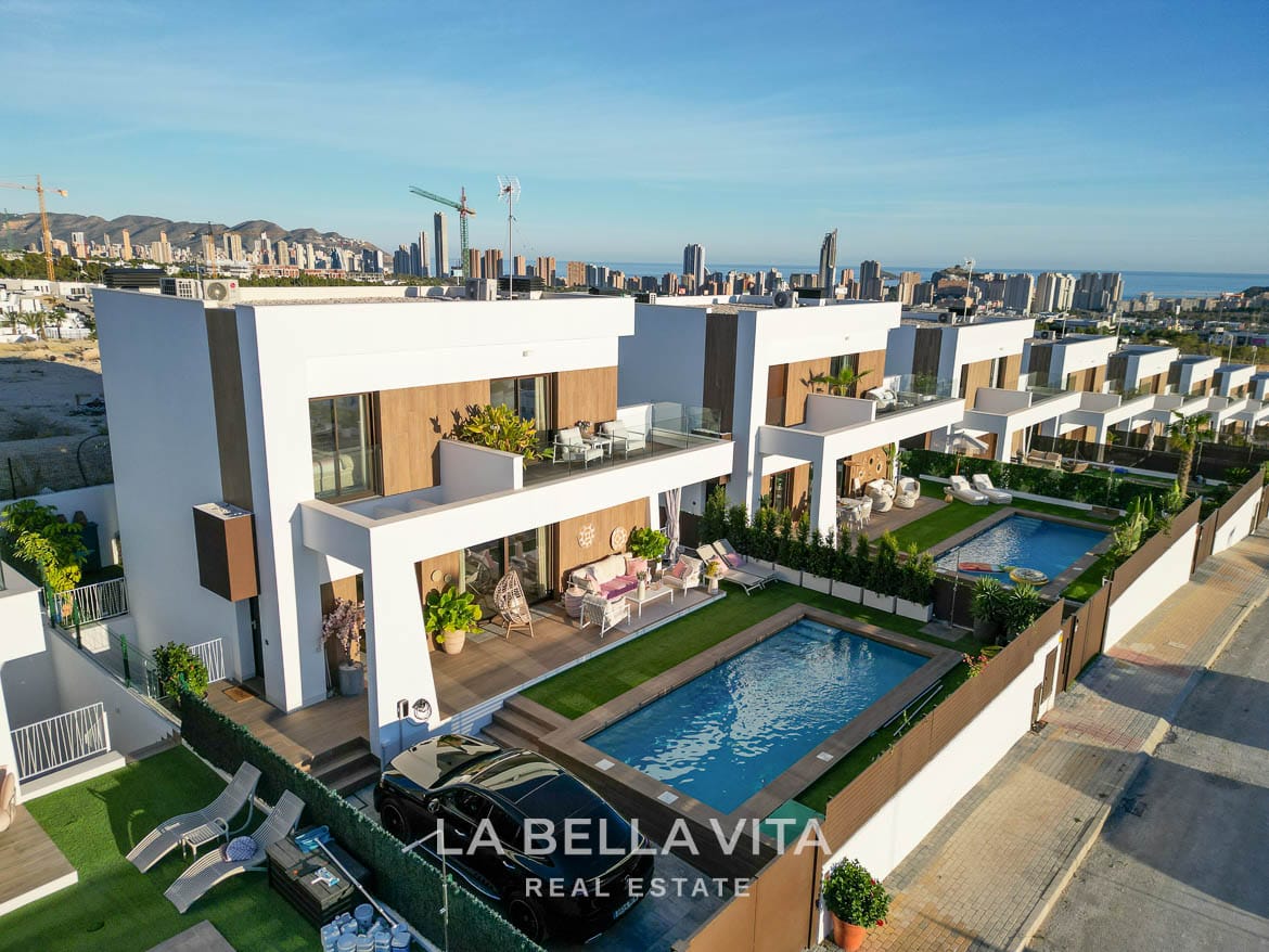 Modern Resale Villa with Basement and Private Pool for Sale in Finestrat-4-2 Aerial view of the villa, private pool, terraces and neighbouring homes in Finestrat, Alicante.