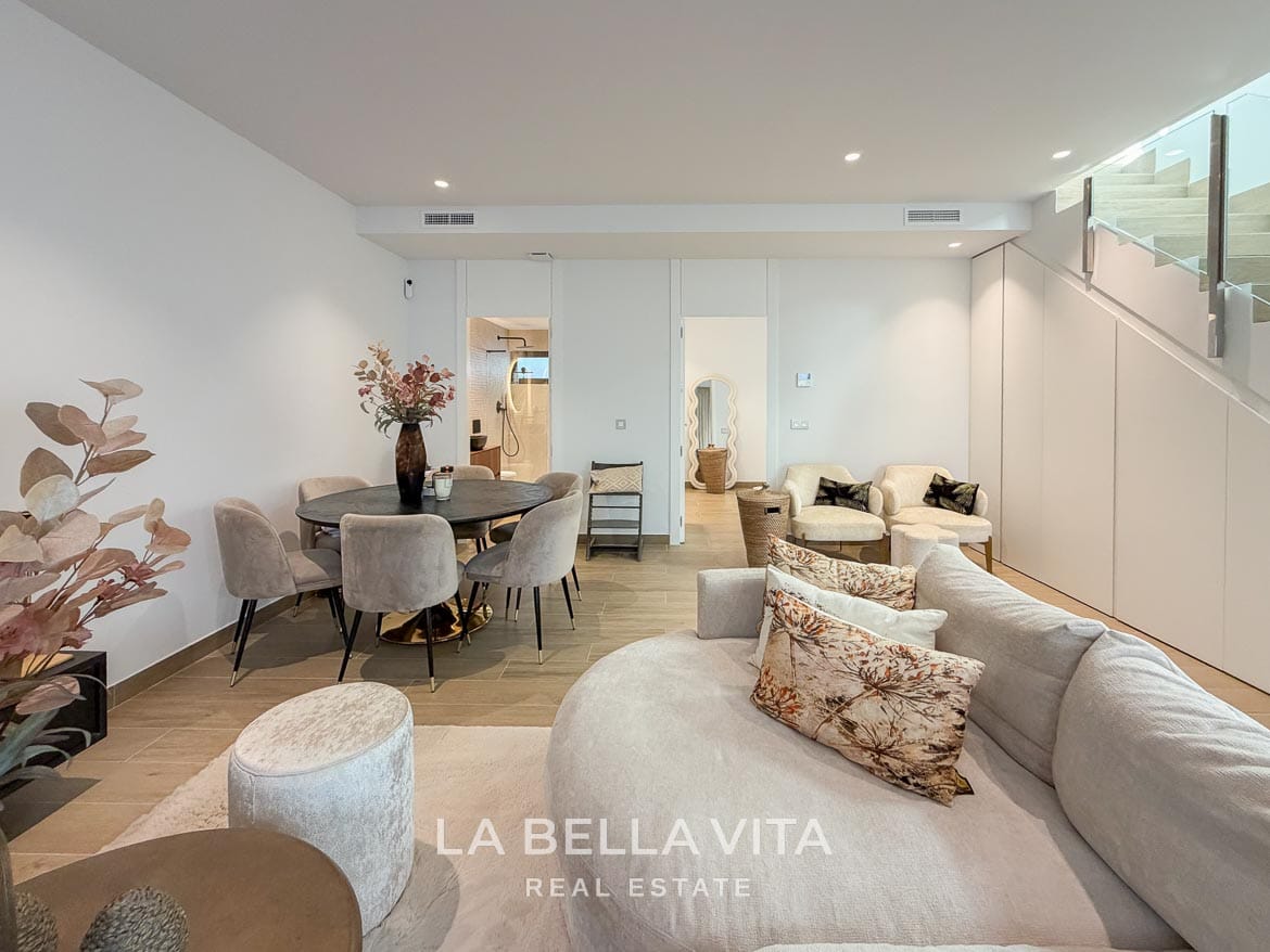 Modern Resale Villa with Basement and Private Pool for Sale in Finestrat-44 Basement lounge looking towards the dining table and adjoining rooms in Finestrat, Alicante.