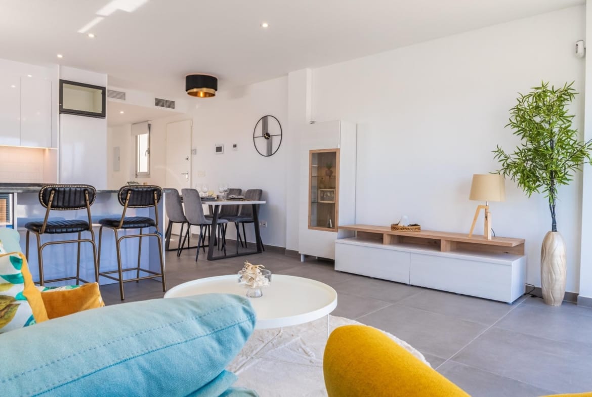 Living and dining area beside the open-plan kitchen in Torre del Rame, Los Alcázares, Murcia