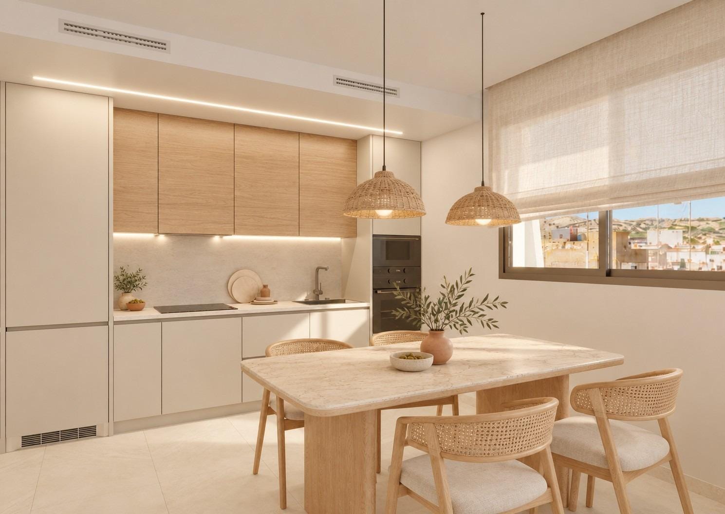 New-Build-Apartments-in-Central-Santa-Pola-Near-the-Beach-5 Apartment kitchen and dining area with white and timber cabinets in Santa Pola, Alicante