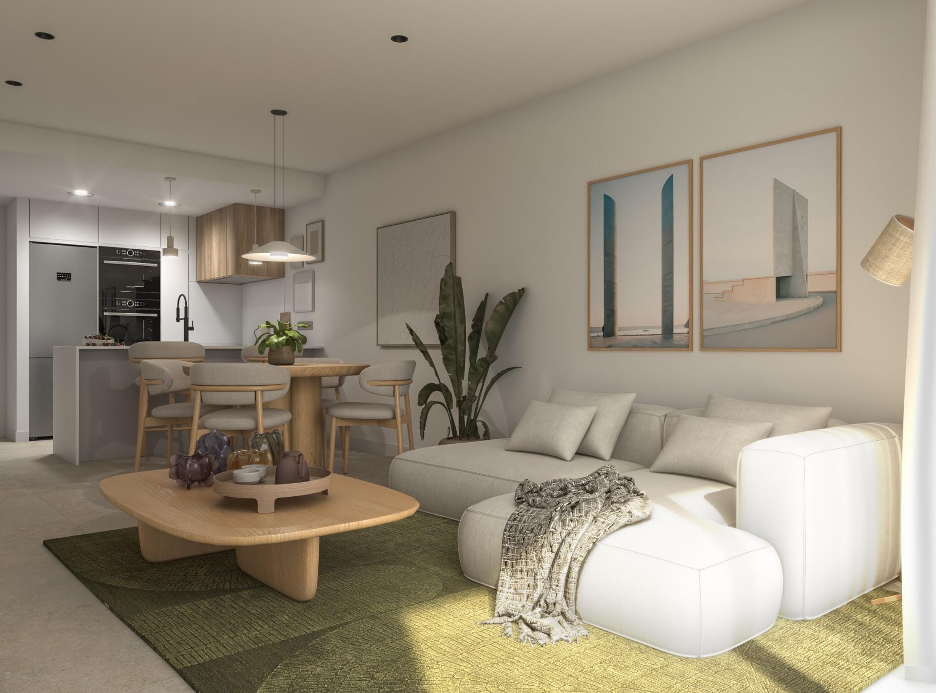 Open-plan living room with a pale sofa, dining table and fitted kitchen in Guardamar del Segura, Alicante
