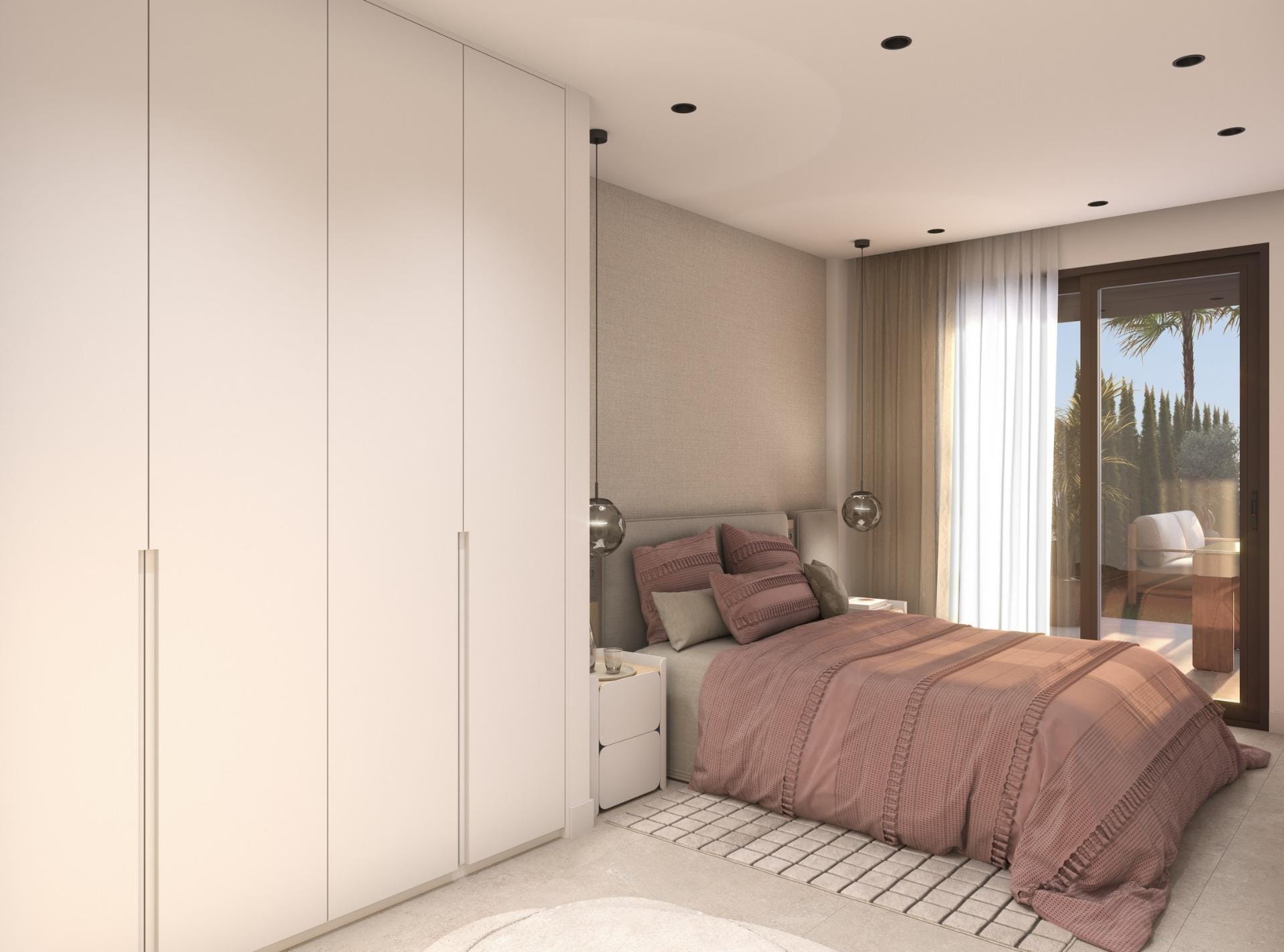 New-Build-Apartments-in-Guardamar-del-Segura-5 Bedroom with white wardrobes, rose-coloured bedding and glazed terrace doors in Guardamar del Segura, Alicante