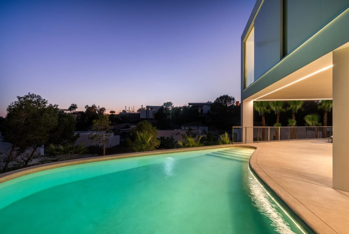 Illuminated private pool and covered terrace at Las Colinas Golf, Orihuela, Alicante