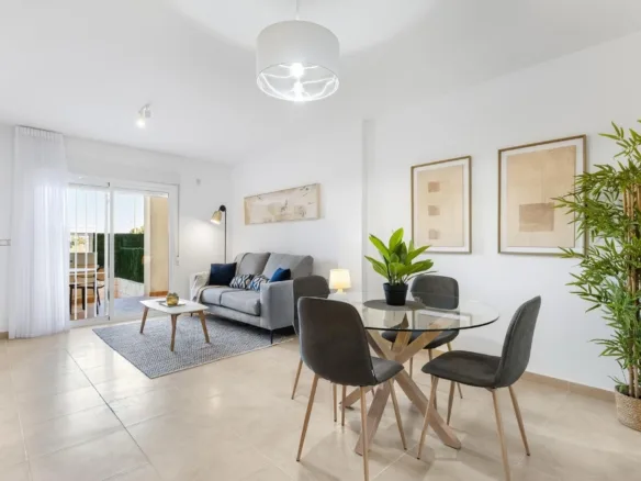 Furnished living and dining room with balcony doors in Lomas de Cabo Roig, Alicante