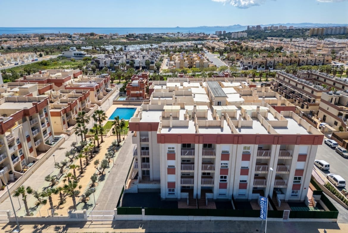 Front aerial view of the residential complex in Lomas de Cabo Roig, Alicante