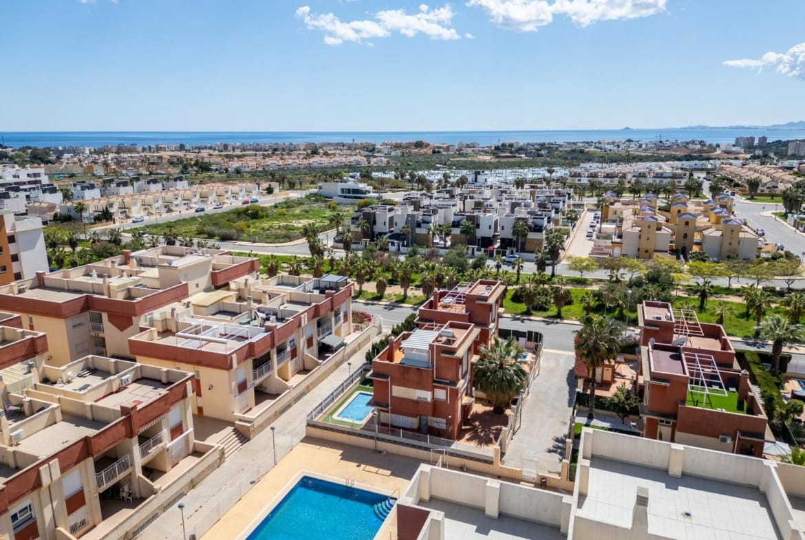 Elevated view across the neighbourhood towards the coastline in Lomas de Cabo Roig, Alicante
