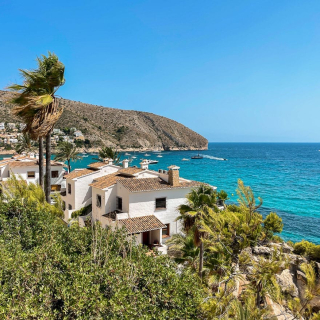 Coastal homes and a turquoise bay on the northern Costa Blanca, Alicante